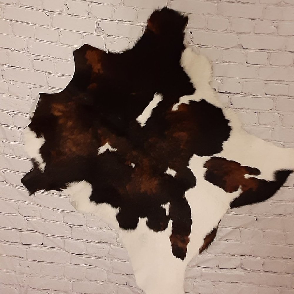 Brazilian Calf Hide Rug - IF IT IS BRAZILIAN WHY DOES IT STILL HAVE HAIR ?!